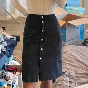 A line black suede skirt